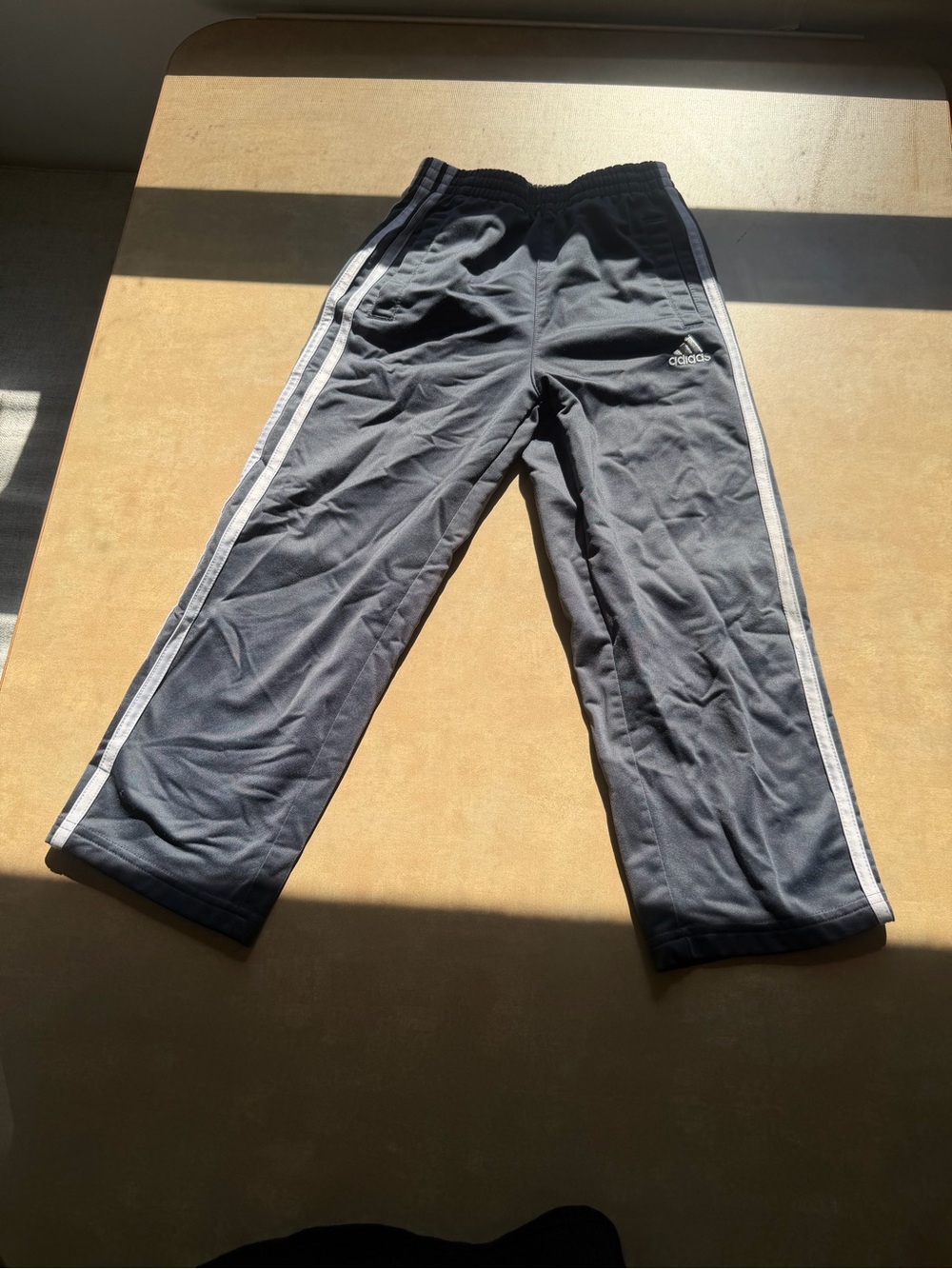 Adidas Youth gray Track Pants with White Side Stripes 5 has some flaws